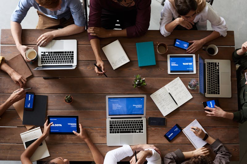 ASC operations team coordinating revenue cycle management on devices