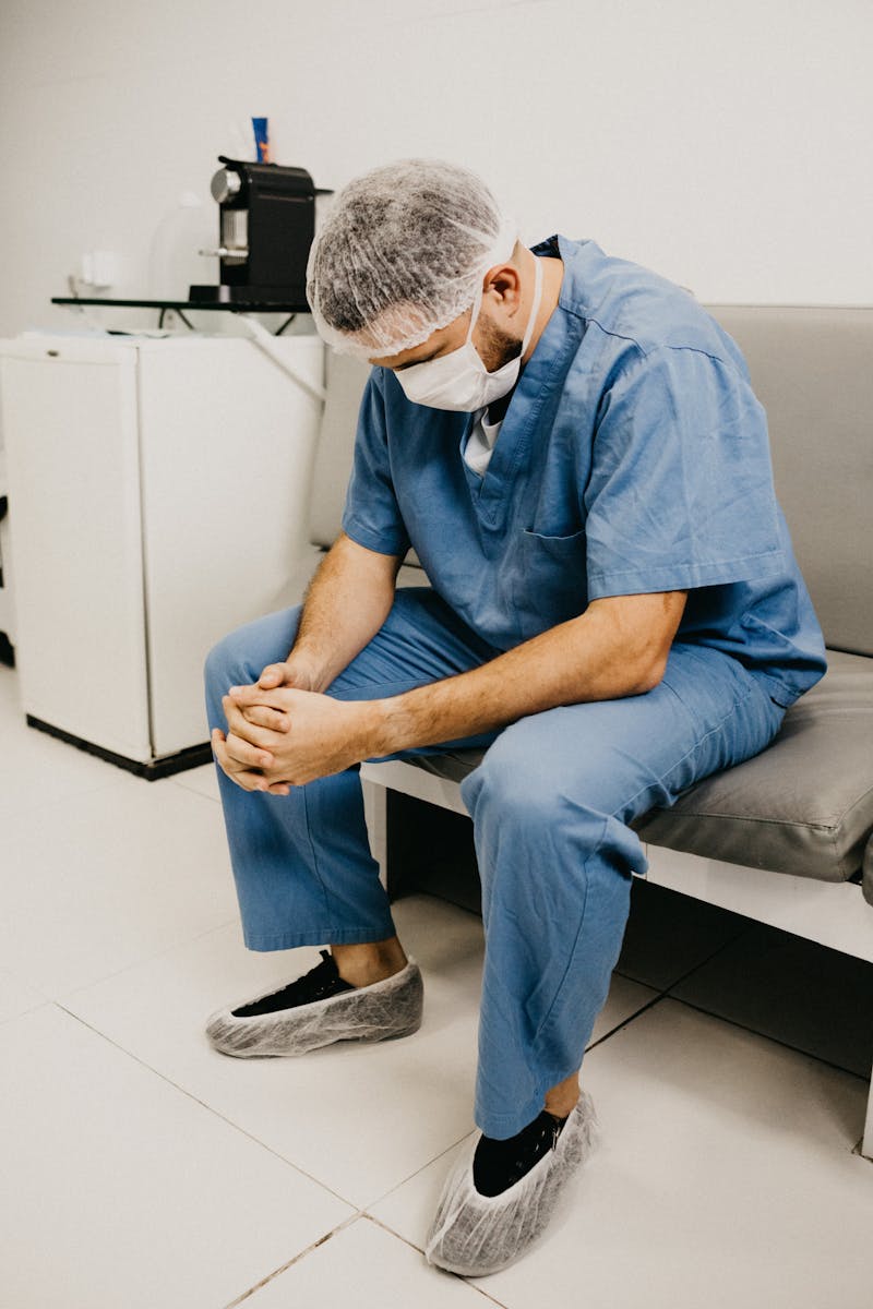 Pain management specialist in clinical setting between procedures