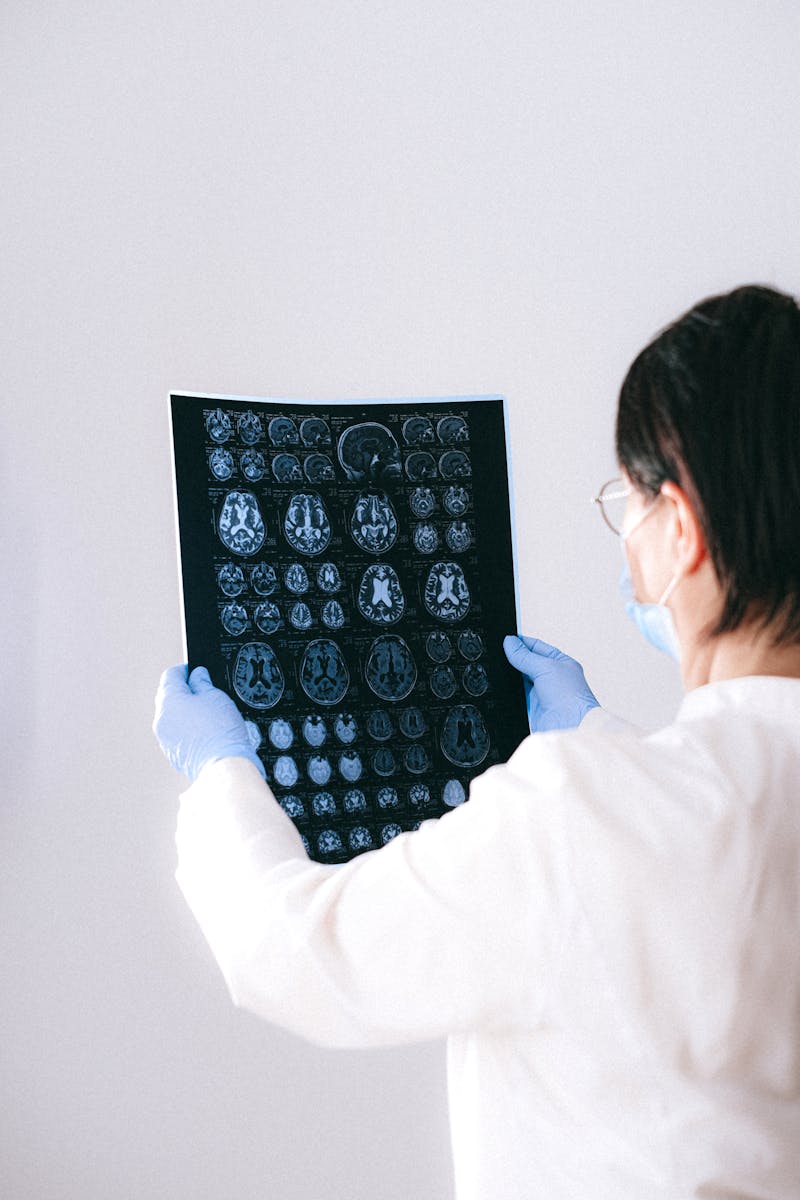 Physician reviewing orthopedic diagnostic imaging for surgical planning
