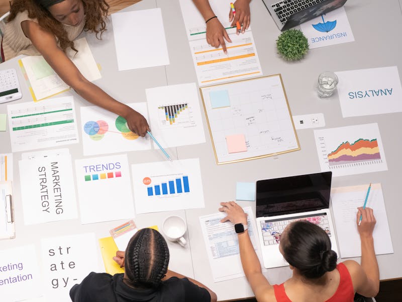 Team analyzing healthcare performance data trends and analytics